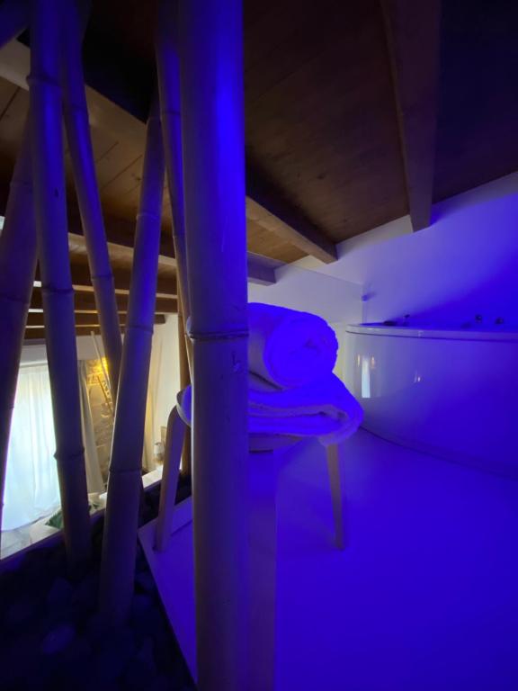 Postel nebo postele na pokoji v ubytování La Volta Rooms Locazione turistica