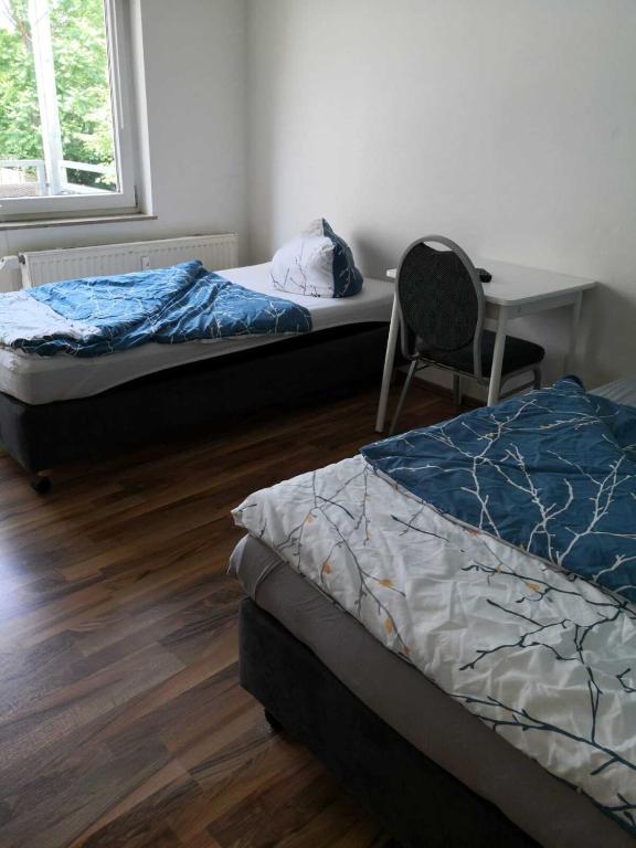 Postel nebo postele na pokoji v ubytování Hostel im Medizinerviertel