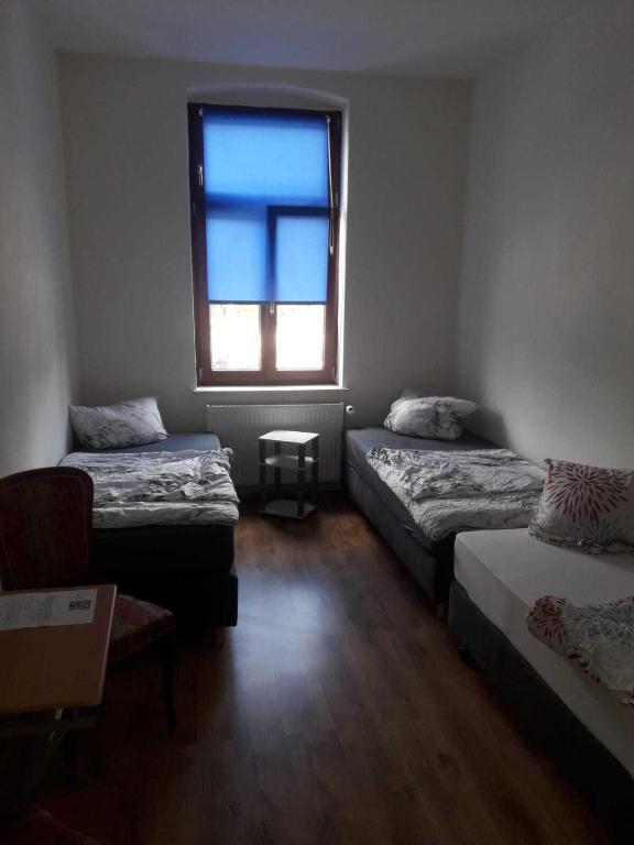 Postel nebo postele na pokoji v ubytování Hostel im Medizinerviertel