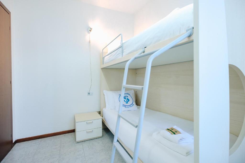 Posteľ alebo postele v izbe v ubytovaní La Maison
