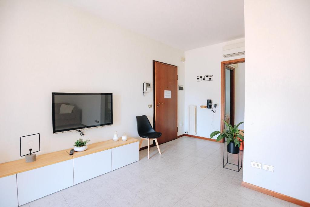 Televízia a/alebo spoločenská miestnosť v ubytovaní La Maison