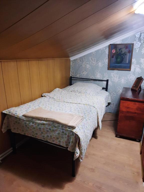 Postel nebo postele na pokoji v ubytování Tina's Homestay