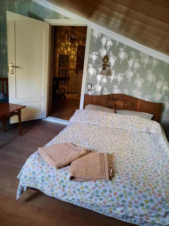 Postel nebo postele na pokoji v ubytování Tina's Homestay