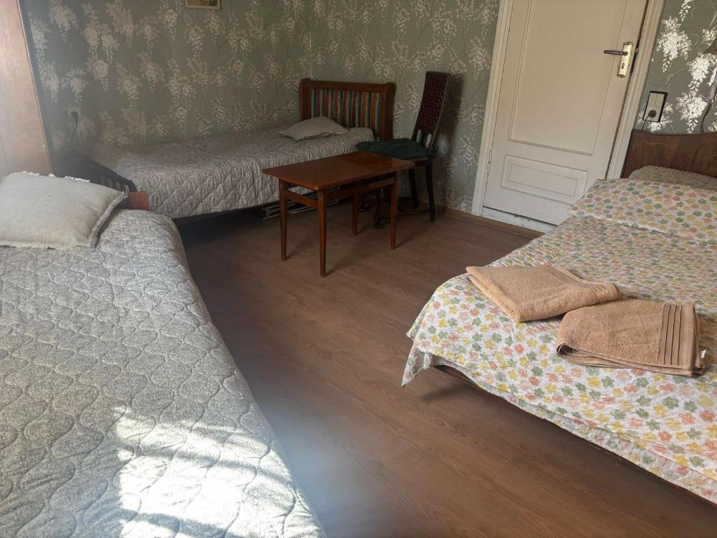 Postel nebo postele na pokoji v ubytování Tina's Homestay