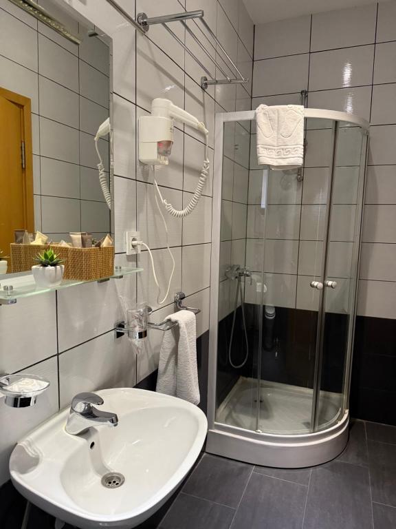 Koupelna v ubytování Deluxe Nortel Hotel