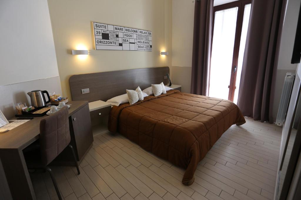 Posteľ alebo postele v izbe v ubytovaní Suite 39 B&B