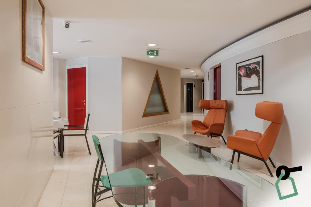 Posezení v ubytování HOTIDAY Room Collection - Trapani