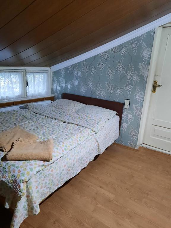 Postel nebo postele na pokoji v ubytování Tina's Homestay
