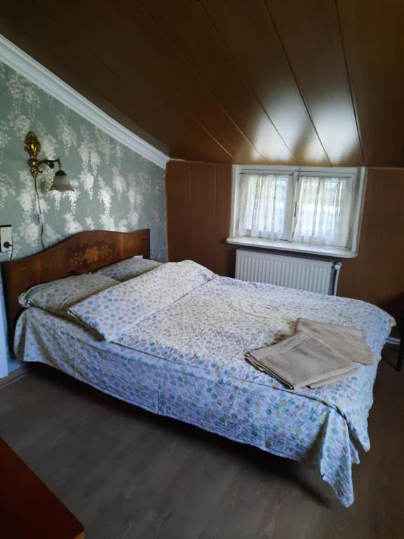 Postel nebo postele na pokoji v ubytování Tina's Homestay