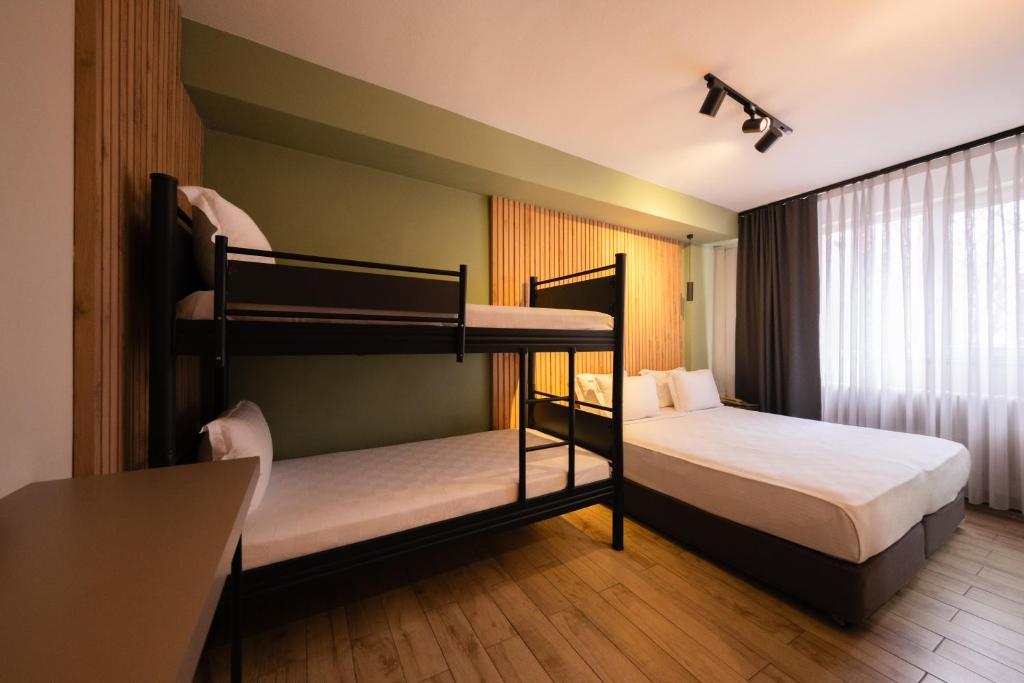 Postel nebo postele na pokoji v ubytování Polek Hotel