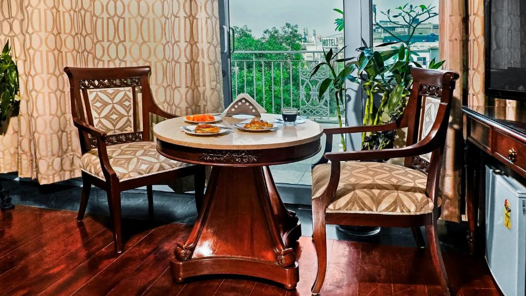 Posezení v ubytování Hotel Ajanta - Colonial Charm Award Winning Luxury Hotel in the Heart of the City