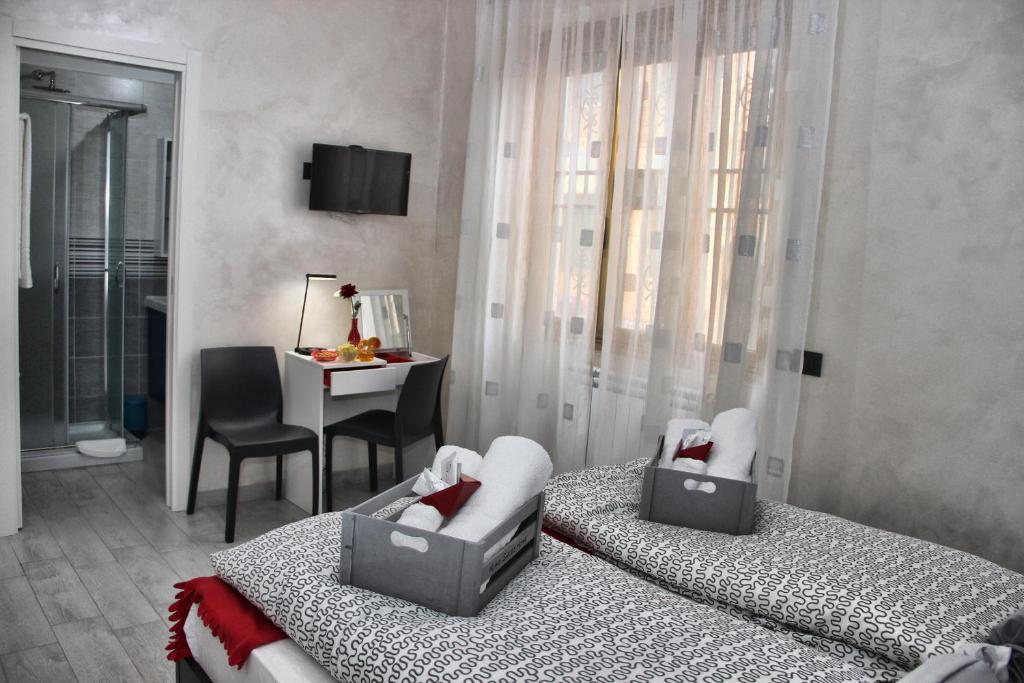 Posteľ alebo postele v izbe v ubytovaní B&B J&B