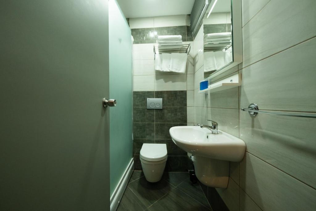 Koupelna v ubytování Polek Hotel