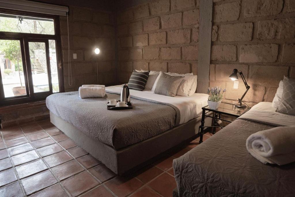 Postel nebo postele na pokoji v ubytování Hotel Sol y Fiesta