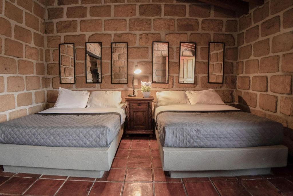 Postel nebo postele na pokoji v ubytování Hotel Sol y Fiesta