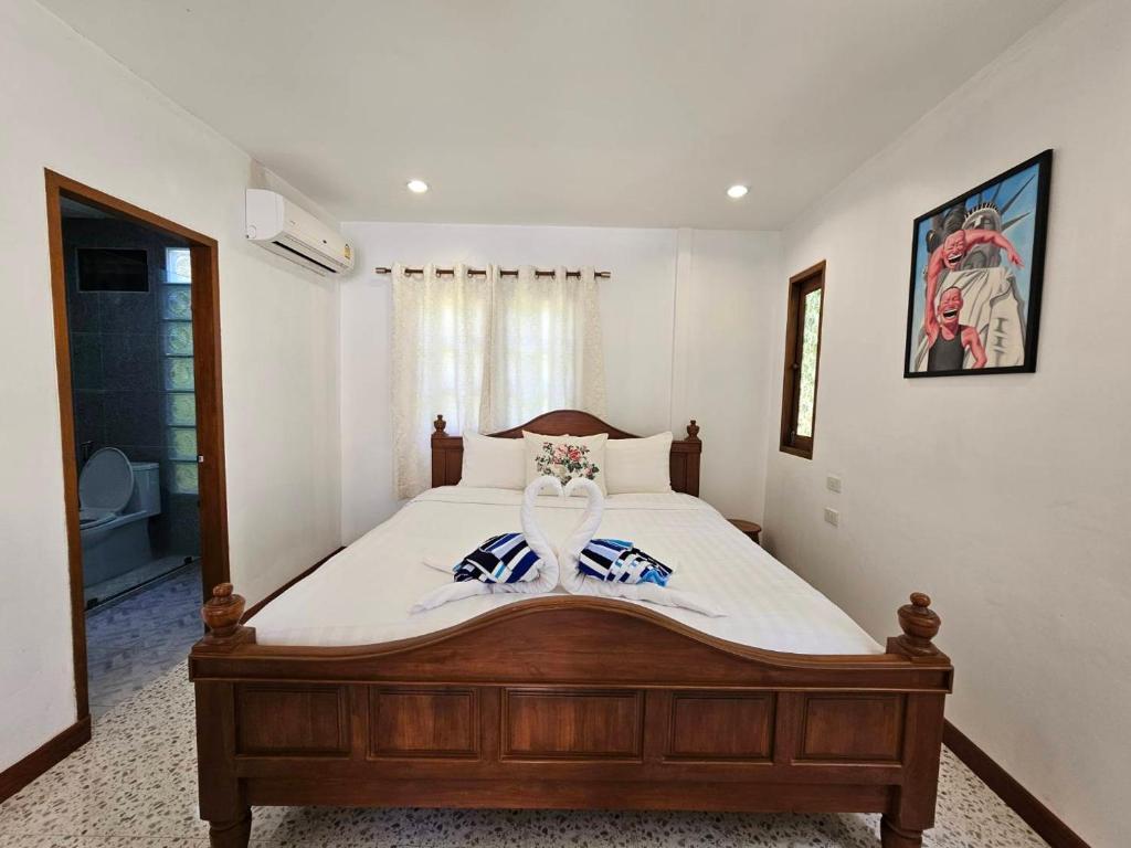 Postel nebo postele na pokoji v ubytování Tropical Oasis Aoyon Beach House