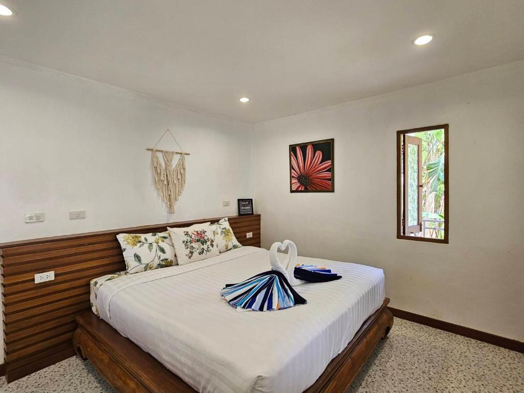 Postel nebo postele na pokoji v ubytování Tropical Oasis Aoyon Beach House
