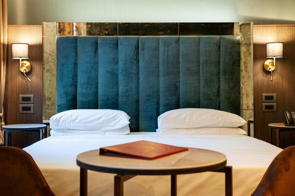 Postel nebo postele na pokoji v ubytování Hotel Campiello