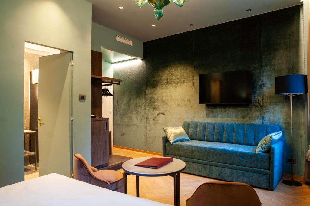 TV a/nebo společenská místnost v ubytování Hotel Campiello