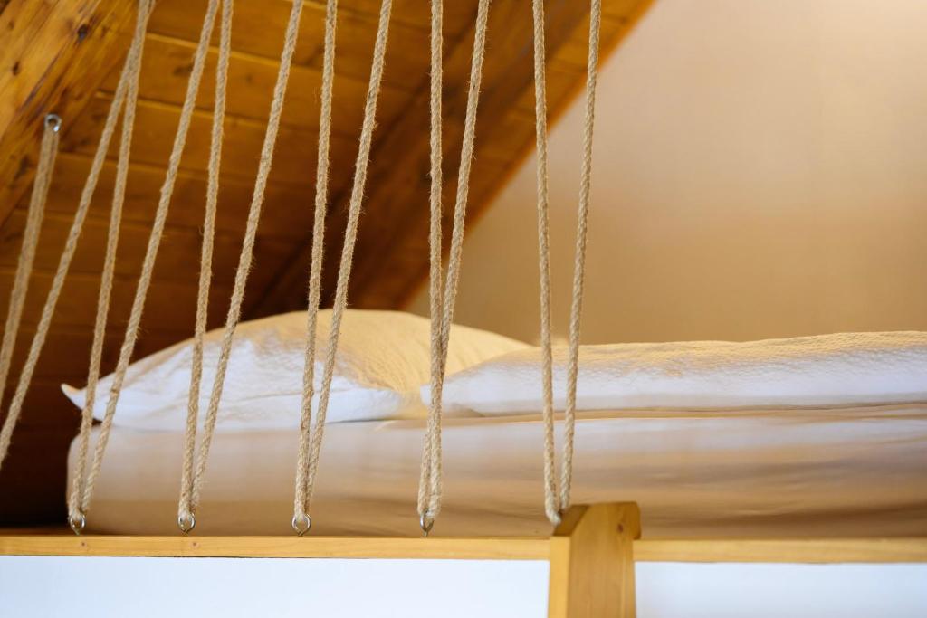Postel nebo postele na pokoji v ubytování Apartmány Mezivodí