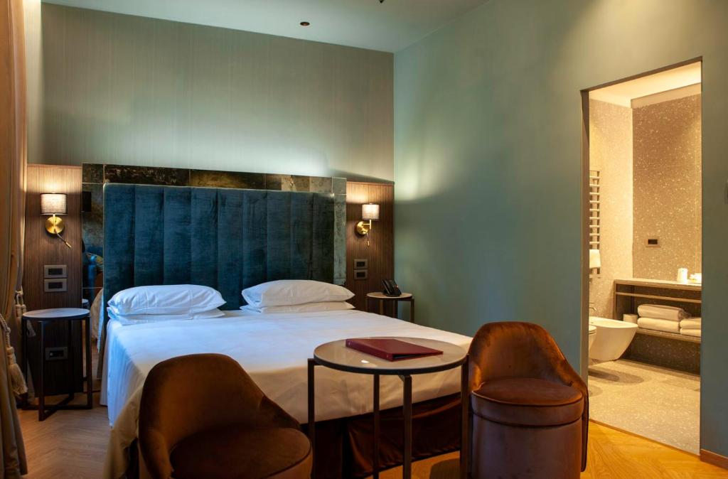 Postel nebo postele na pokoji v ubytování Hotel Campiello