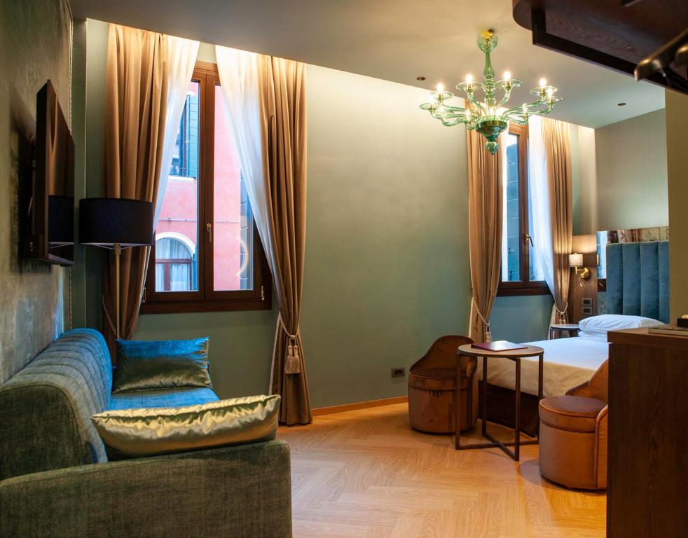 TV a/nebo společenská místnost v ubytování Hotel Campiello