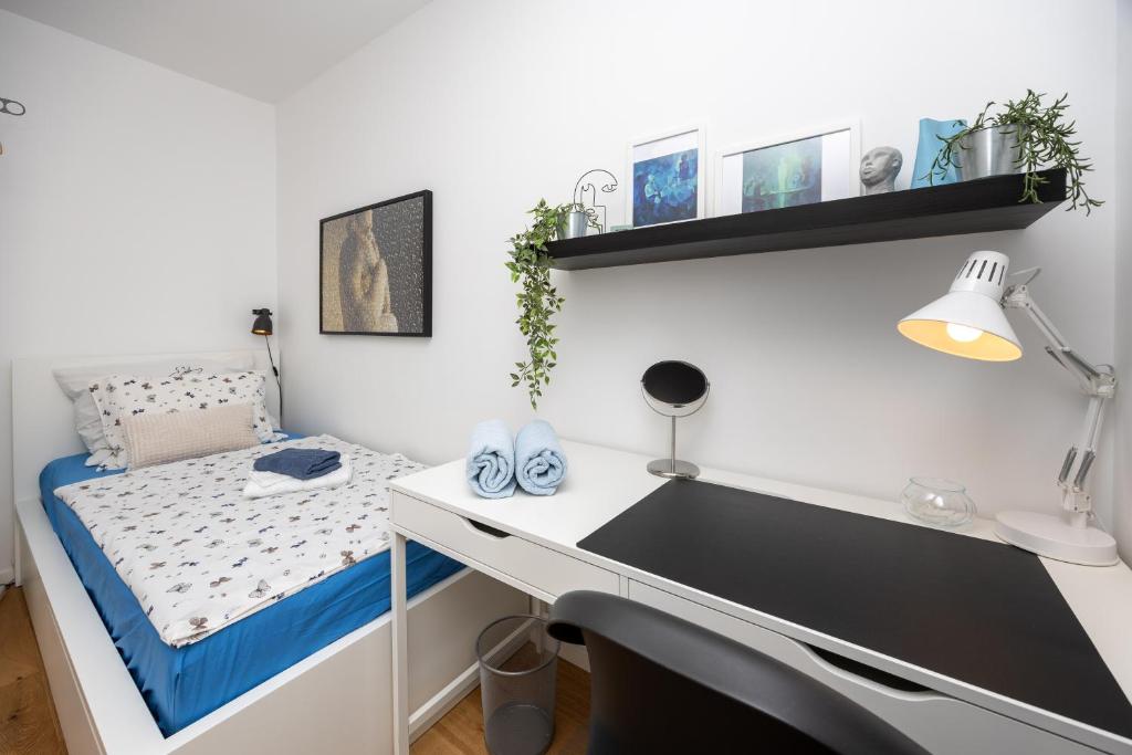 Posteľ alebo postele v izbe v ubytovaní Apartment Sweet Cherry