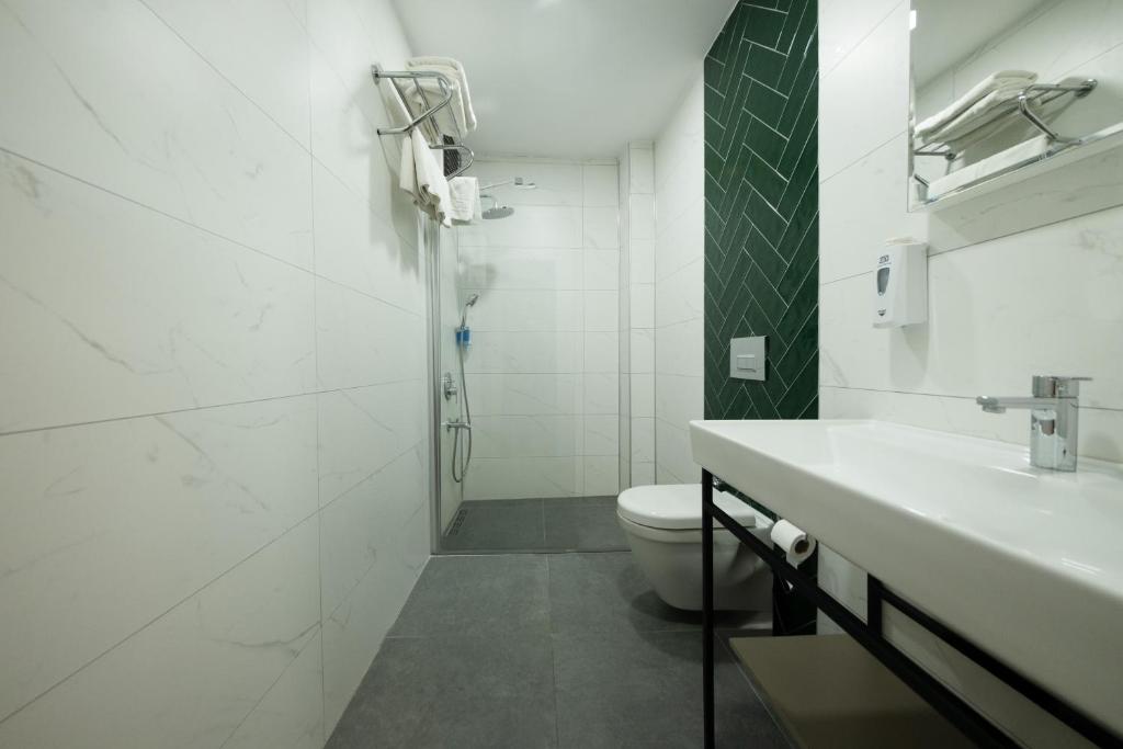 Koupelna v ubytování Polek Hotel