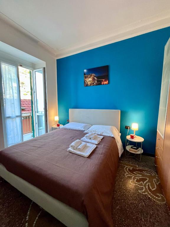 Postel nebo postele na pokoji v ubytování Casa Di Mezzo by Arbaspàa