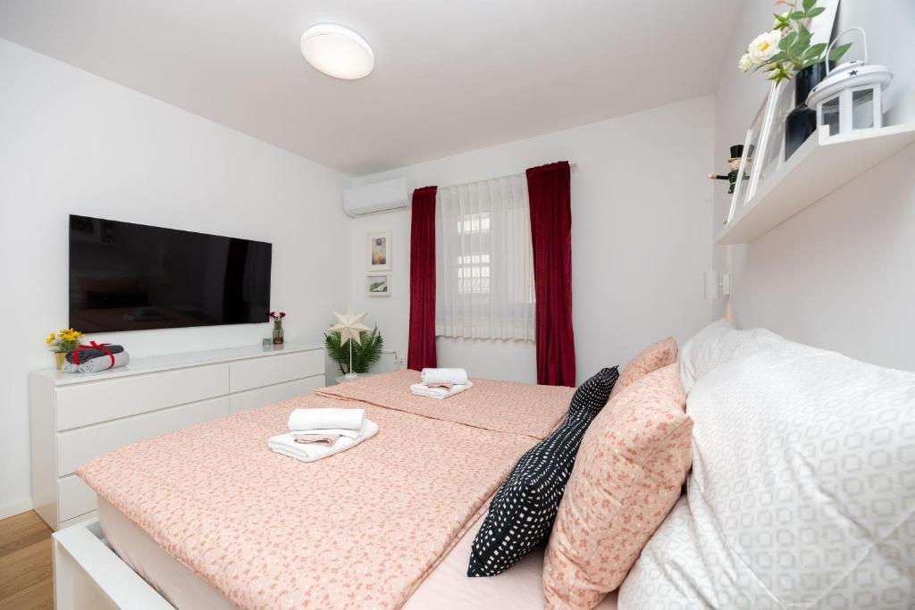 Posteľ alebo postele v izbe v ubytovaní Apartment Sweet Cherry