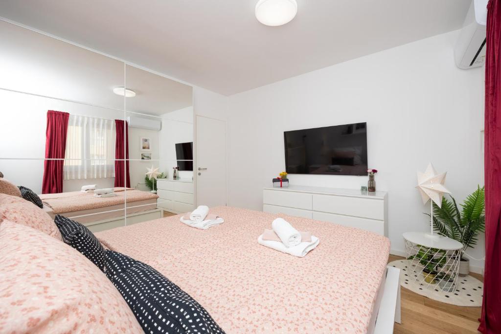 Posteľ alebo postele v izbe v ubytovaní Apartment Sweet Cherry