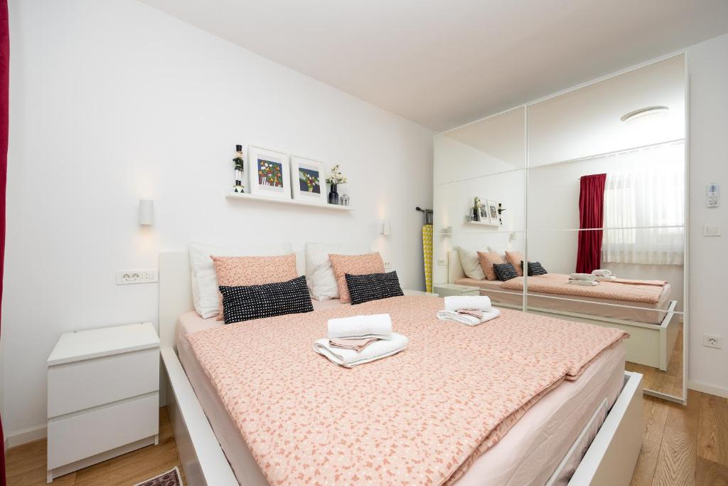 Posteľ alebo postele v izbe v ubytovaní Apartment Sweet Cherry