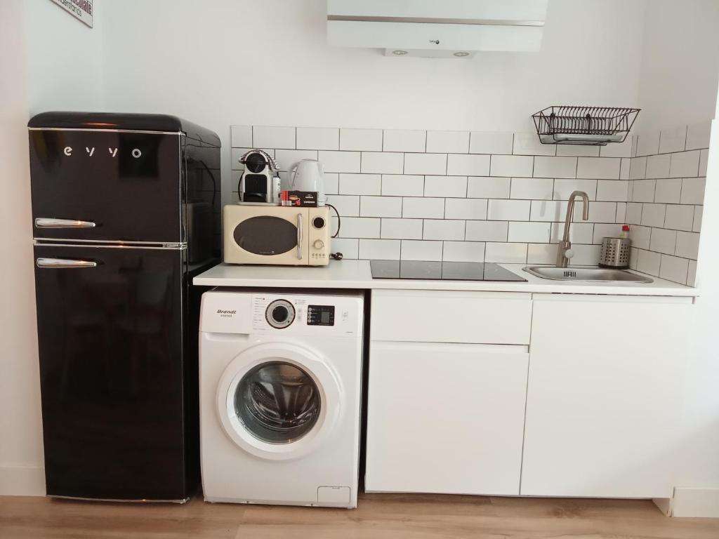 Kuchyň nebo kuchyňský kout v ubytování Sevilla deluxe suites