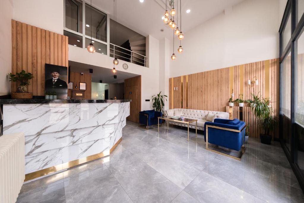 TV a/nebo společenská místnost v ubytování Polek Hotel