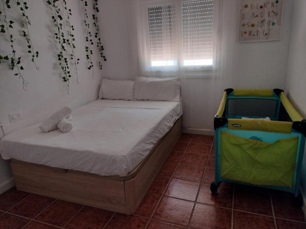 Posteľ alebo postele v izbe v ubytovaní Villa andaluza relax y playa en entorno tranquilo