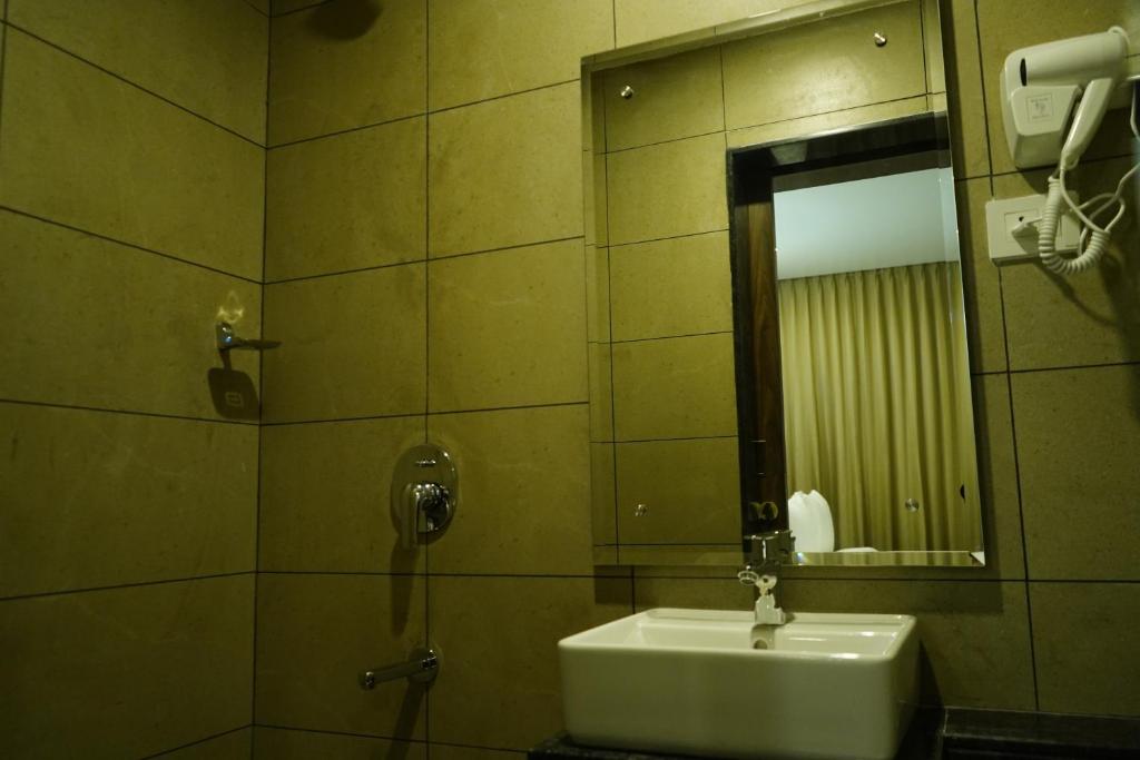 Koupelna v ubytování Jaag Hotel