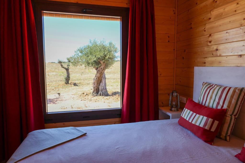 Postel nebo postele na pokoji v ubytování Monte dos Cordeiros