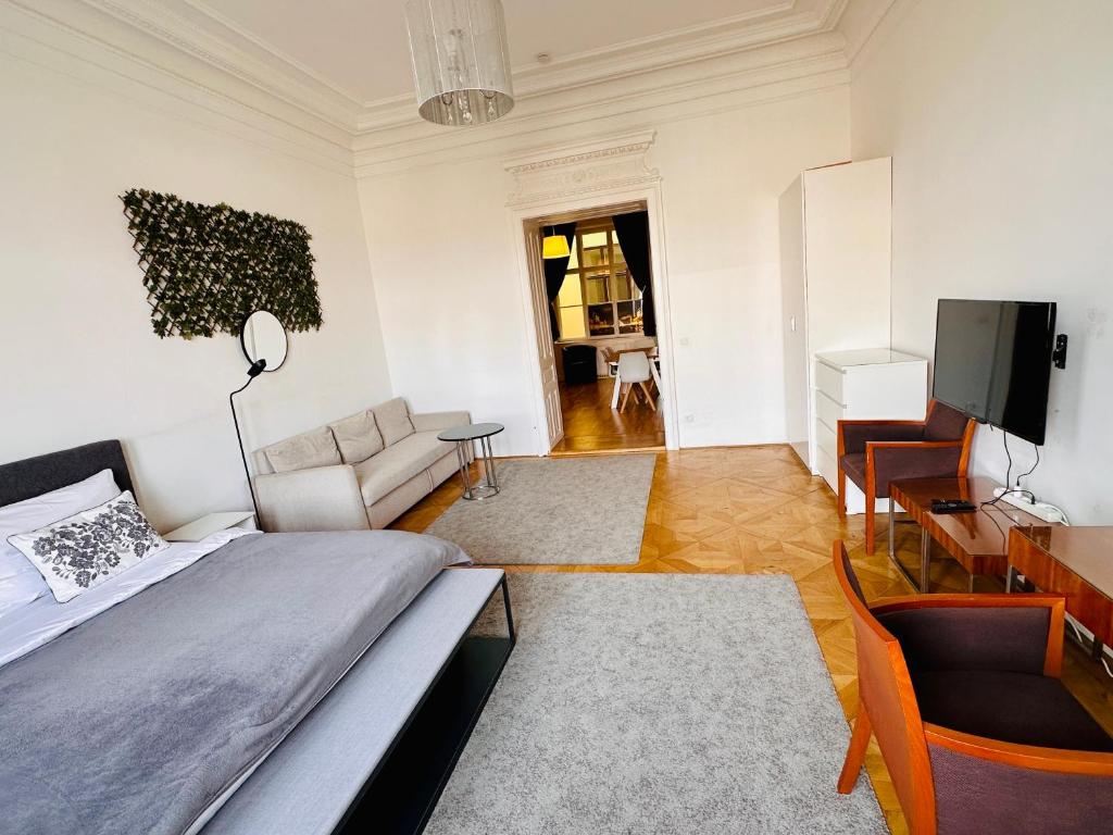 Televízia a/alebo spoločenská miestnosť v ubytovaní Parkview Rudolfsplatz