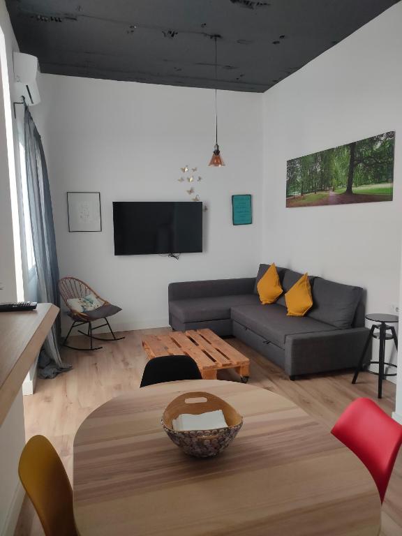 TV a/nebo společenská místnost v ubytování Sevilla deluxe suites