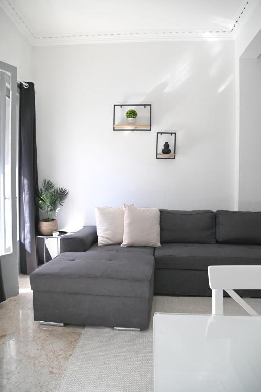 a living room with a couch and a table at Didis Place Nafplio in Nafplio