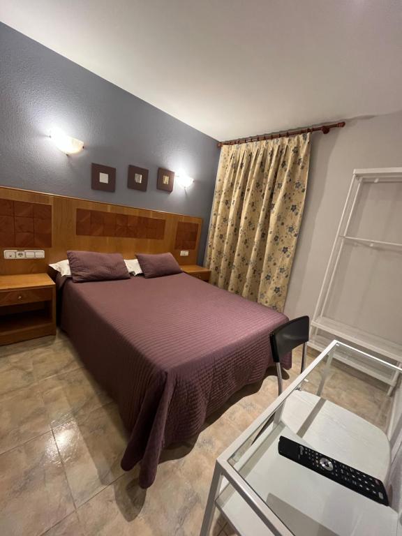 Postel nebo postele na pokoji v ubytování Hostal Azul