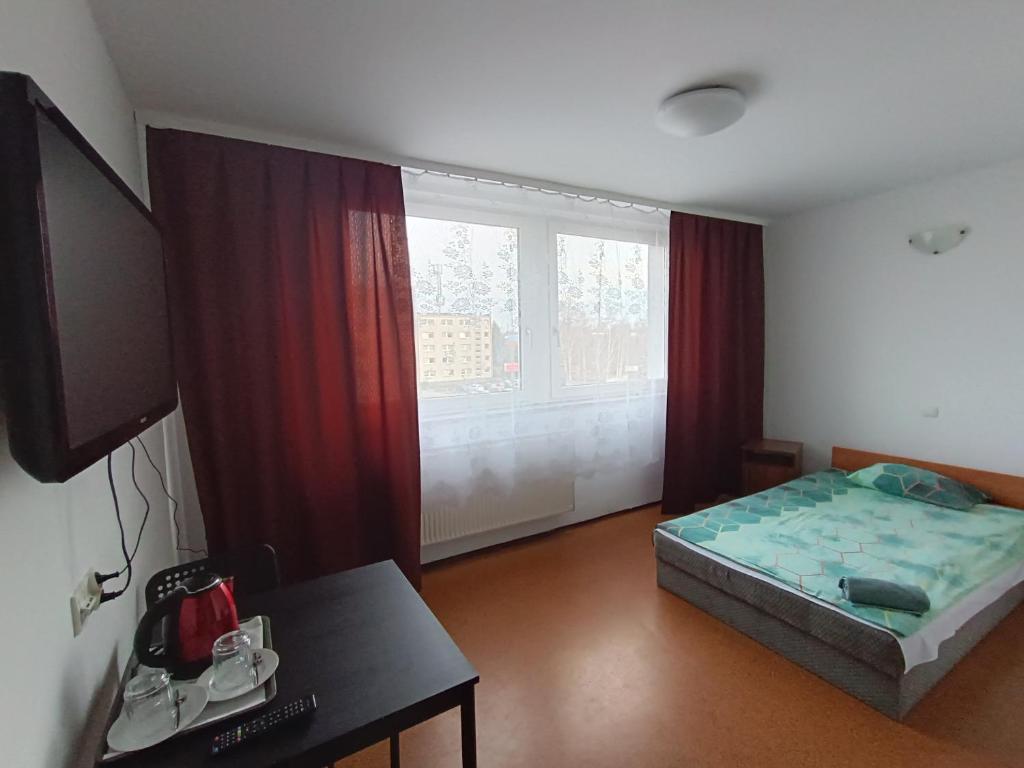 Posteľ alebo postele v izbe v ubytovaní Twój Hostel Bytom