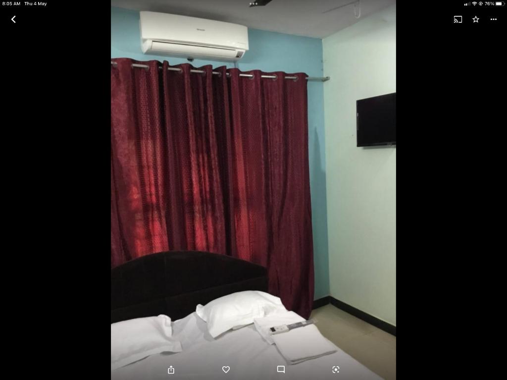 Ένα ή περισσότερα κρεβάτια σε δωμάτιο στο Space craft guest house