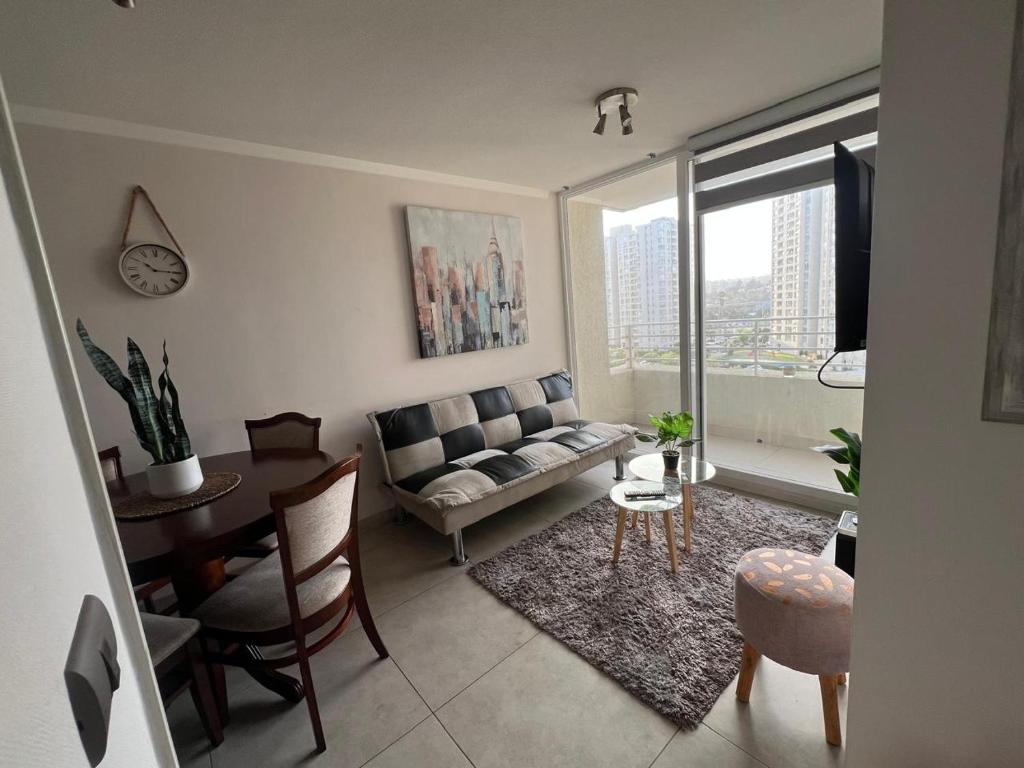 Posezení v ubytování Acogedor Departamento frente Casino y a metros de Av Costanera