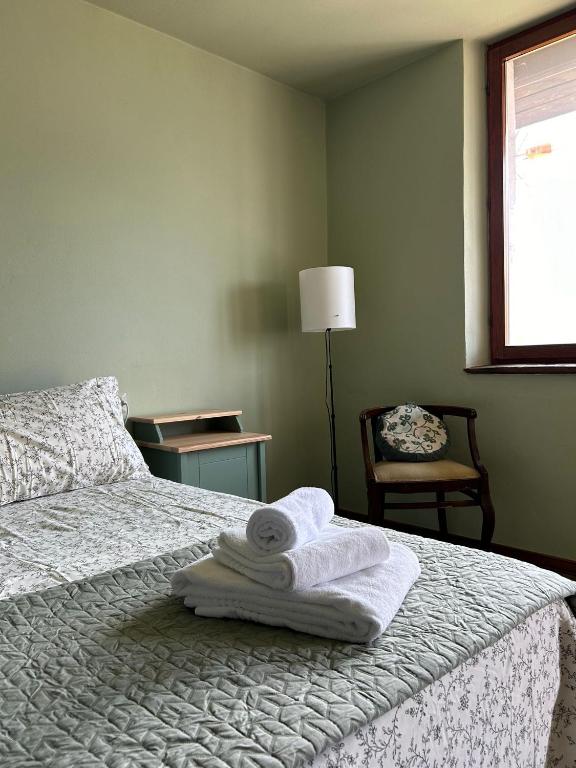 Postel nebo postele na pokoji v ubytování Guest House nel Vigneto