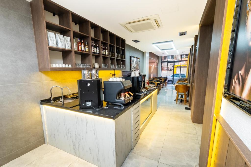 a bar in a restaurant with a counter at Luxury Life Suites in Istanbul