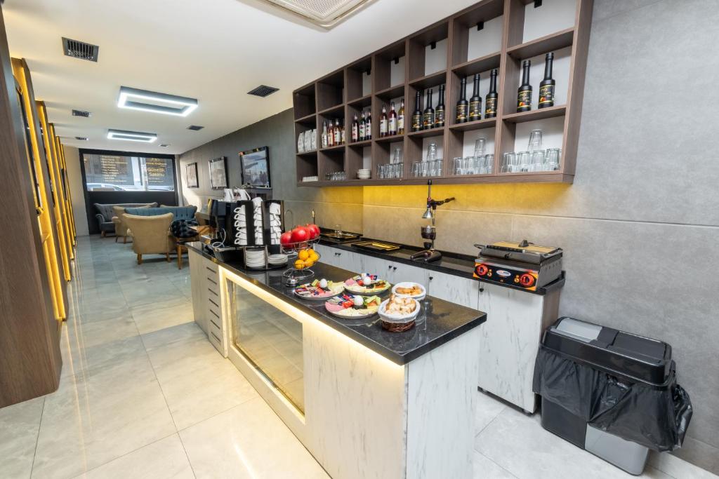 a kitchen with a counter with food on it at Luxury Life Suites in Istanbul