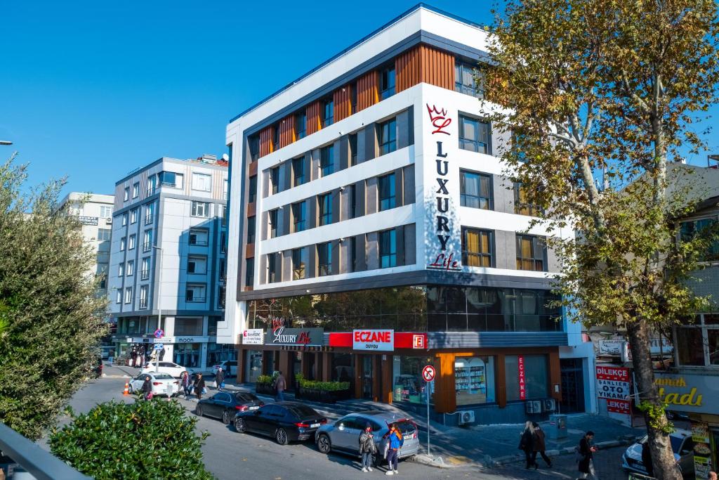 a building with a sign on the side of it at Luxury Life Suites in Istanbul