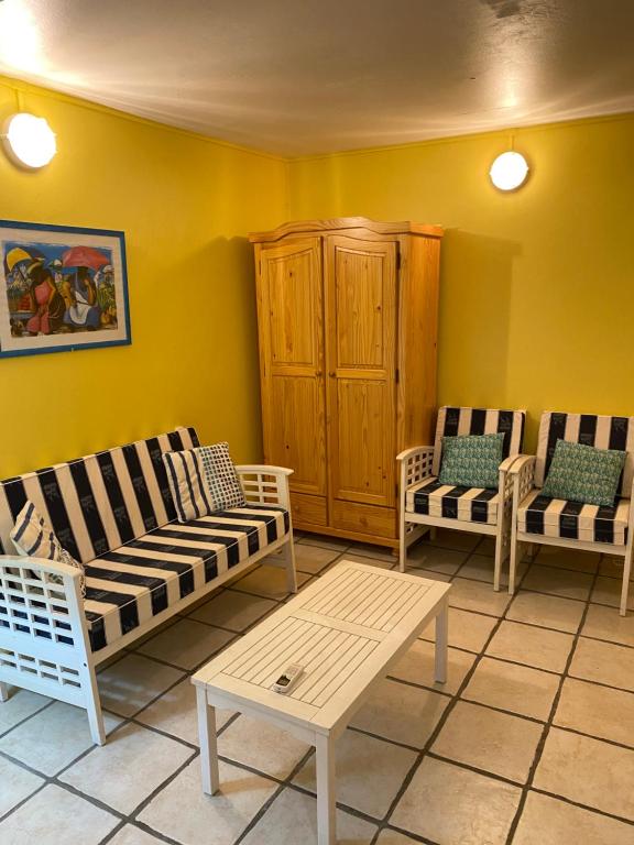 Posedenie v ubytovaní Coco-Mango Apt. D
