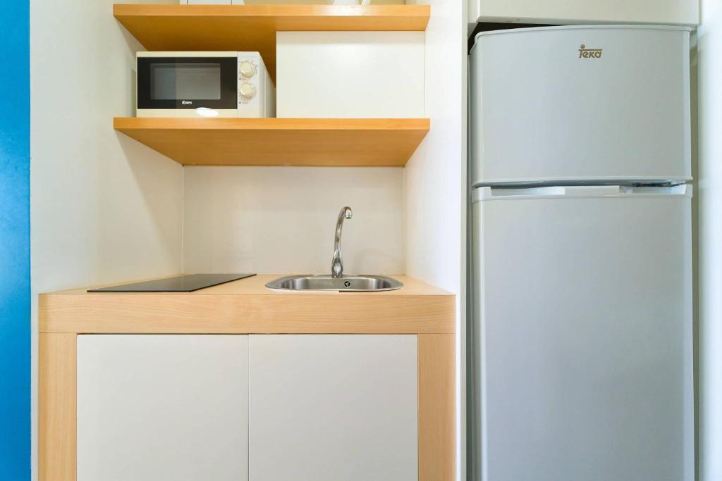 Kuchyň nebo kuchyňský kout v ubytování Salt Apartments Vistalmar